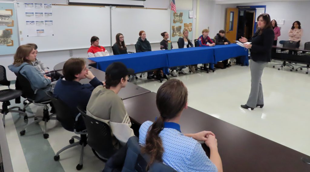 Ms.-Dickinson-congratulates-the-honor-graduate